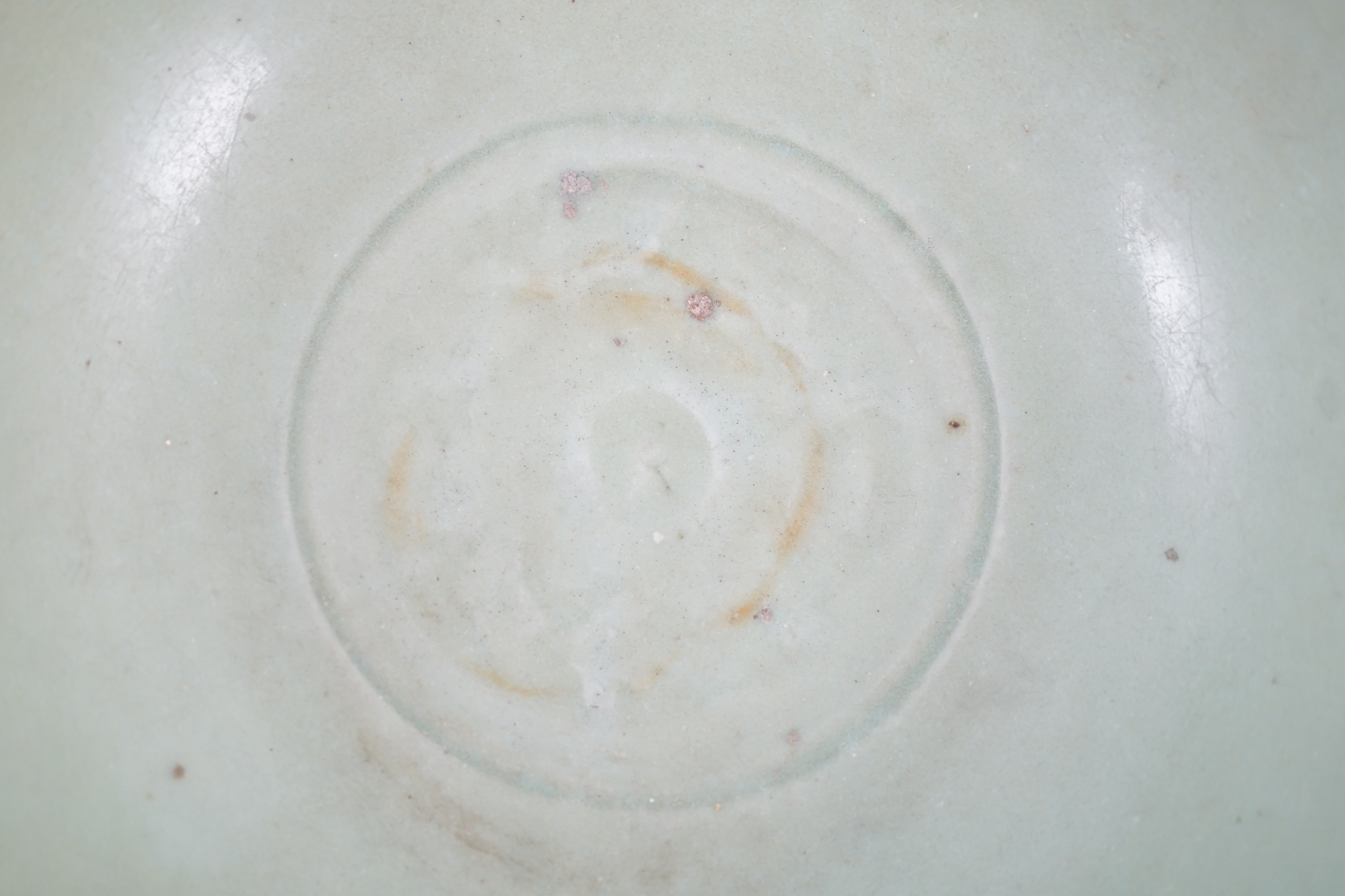 A Chinese Ming Longquan celadon bowl, 15th century, glaze scratched